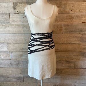 Bebe women’s  white & black sequinned dress in size‎ small